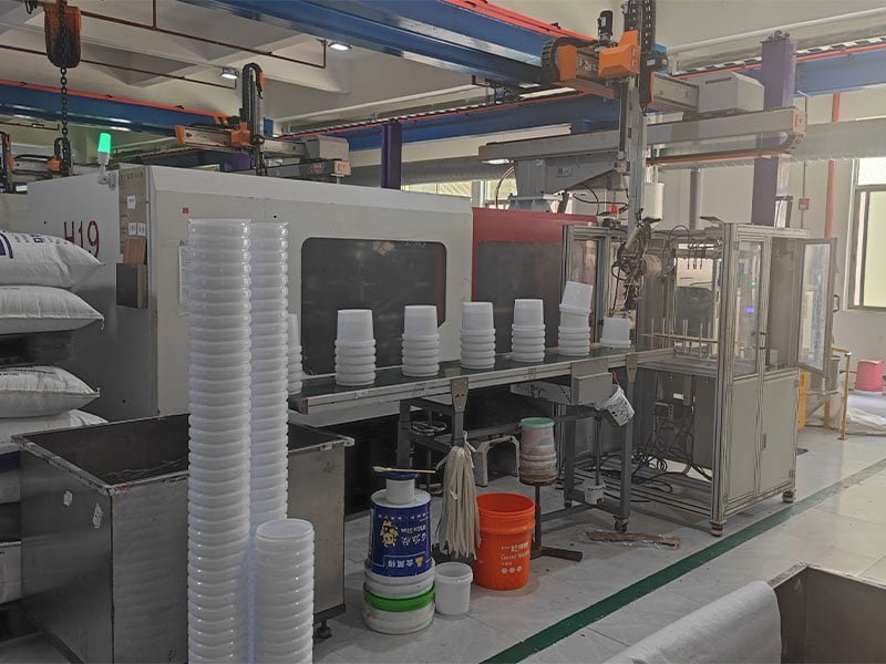 Main injection molding production floor with automated lines
